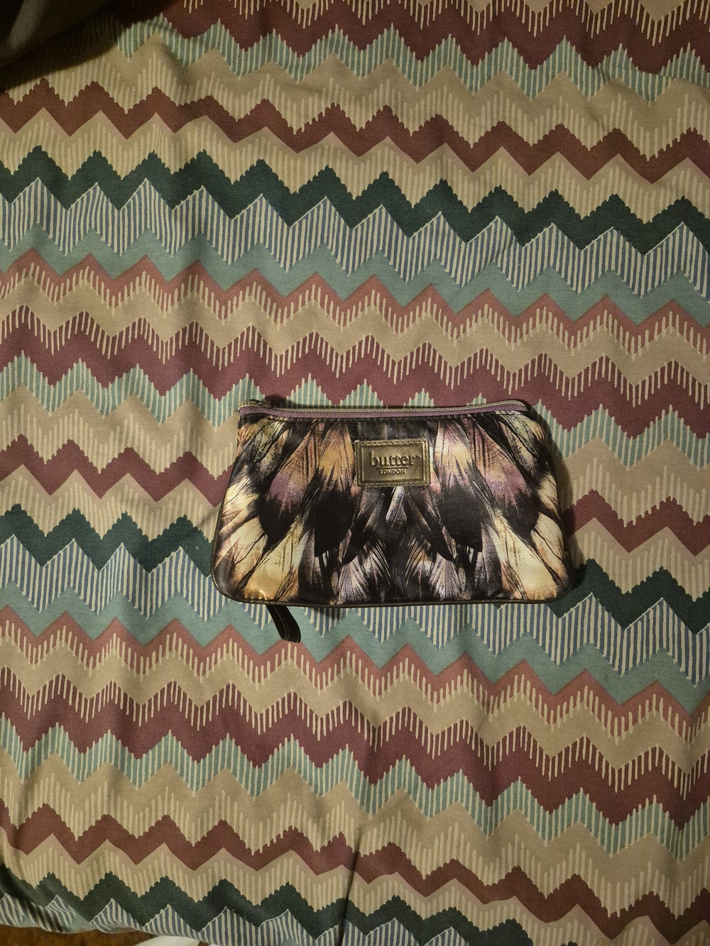 butter LONDON Feather Print Cosmetic Pouch Wristlet Black & Purple